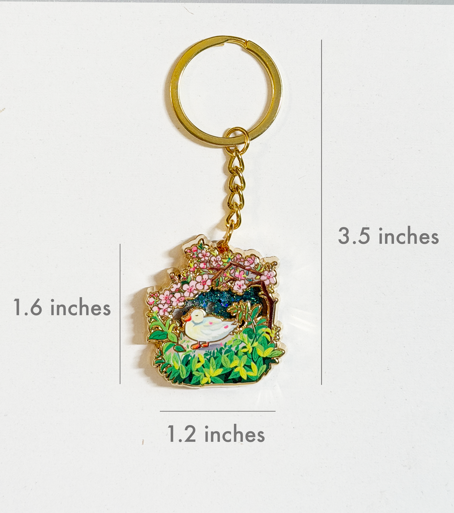 Keychain with measurements on a white background