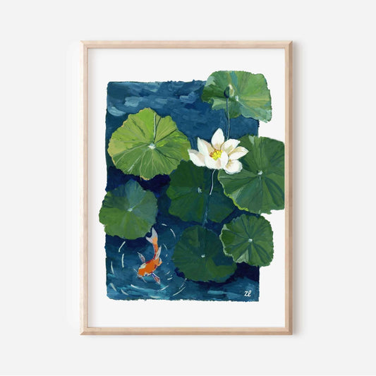Framed artwork of a watercolor painting of a white lotus flower and green lily pads with a goldfish on a blue background.