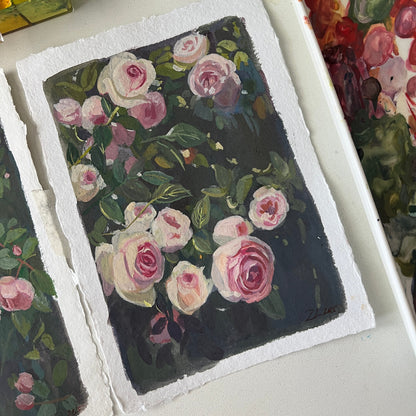 Floral painting on a textured surface with a blurred background