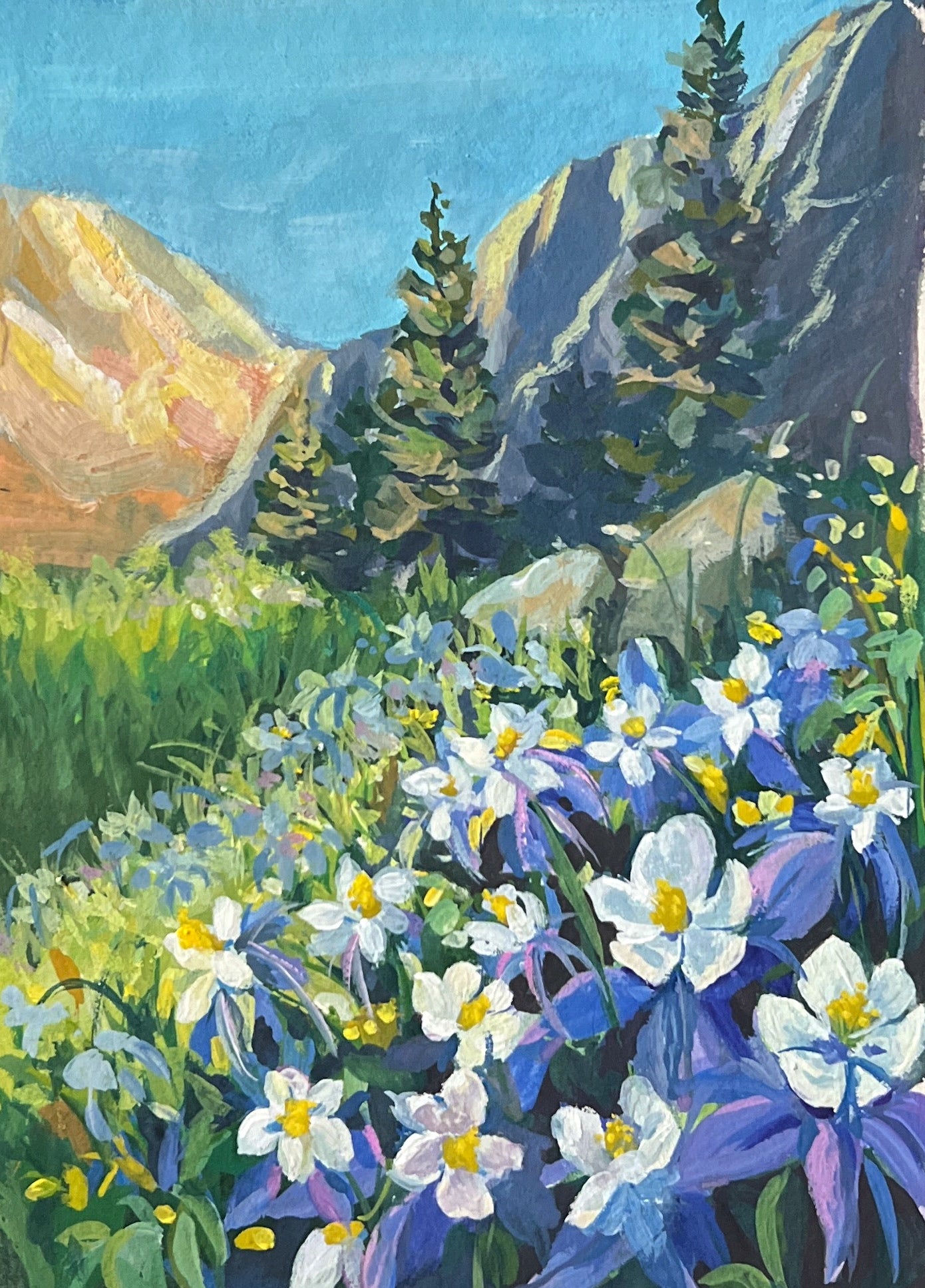Painting of a mountain landscape with flowers on a green grid background, surrounded by art supplies.