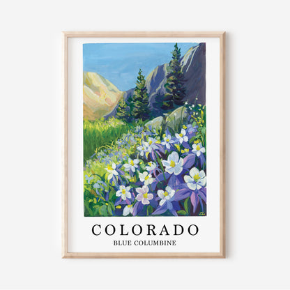 A framed art print featuring a colorful landscape painting of blue columbine flowers in a mountain meadow, with the text 'COLORADO BLUE COLUMBINE' below the artwork. The print is housed in a light natural wood frame and is shown against a clean white background.