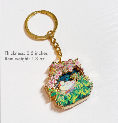 Decorative keychain with floral design on a white background
