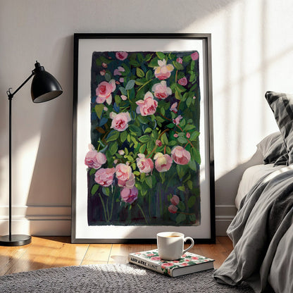Framed floral artwork in a bedroom setting with a lamp and bed.
