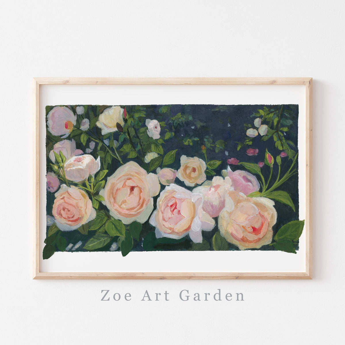 A framed floral art print featuring painted roses in soft peach, cream, and pink tones with dark green foliage against a dark background, displayed on a light wall with the text 'Zoe Art Garden' below the frame.